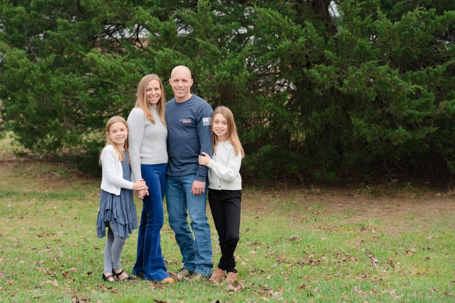 Jim, owner of Air Force One Heating and Cooling, with his family